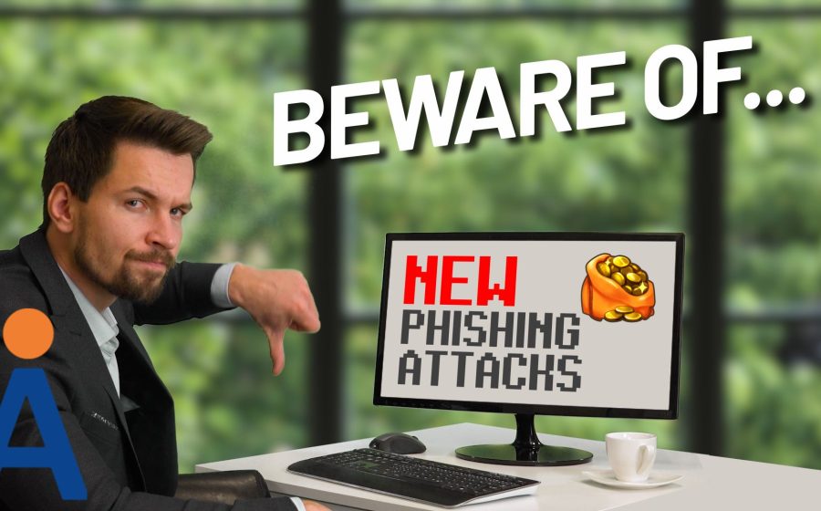 A man in a suit points at a computer monitor displaying the words NEW, NEXT GENERATION ADAPTIVE PHISHING ATTACKS beside a coin bag icon, with BEWARE OF... above him. A large letter A logo appears in the bottom left corner.