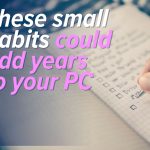 A hand writes in a notebook with checkboxes, while text over the image reads: These small habits could be key to adding years to your PC's life. A blue logo with an orange dot appears in the bottom left corner.